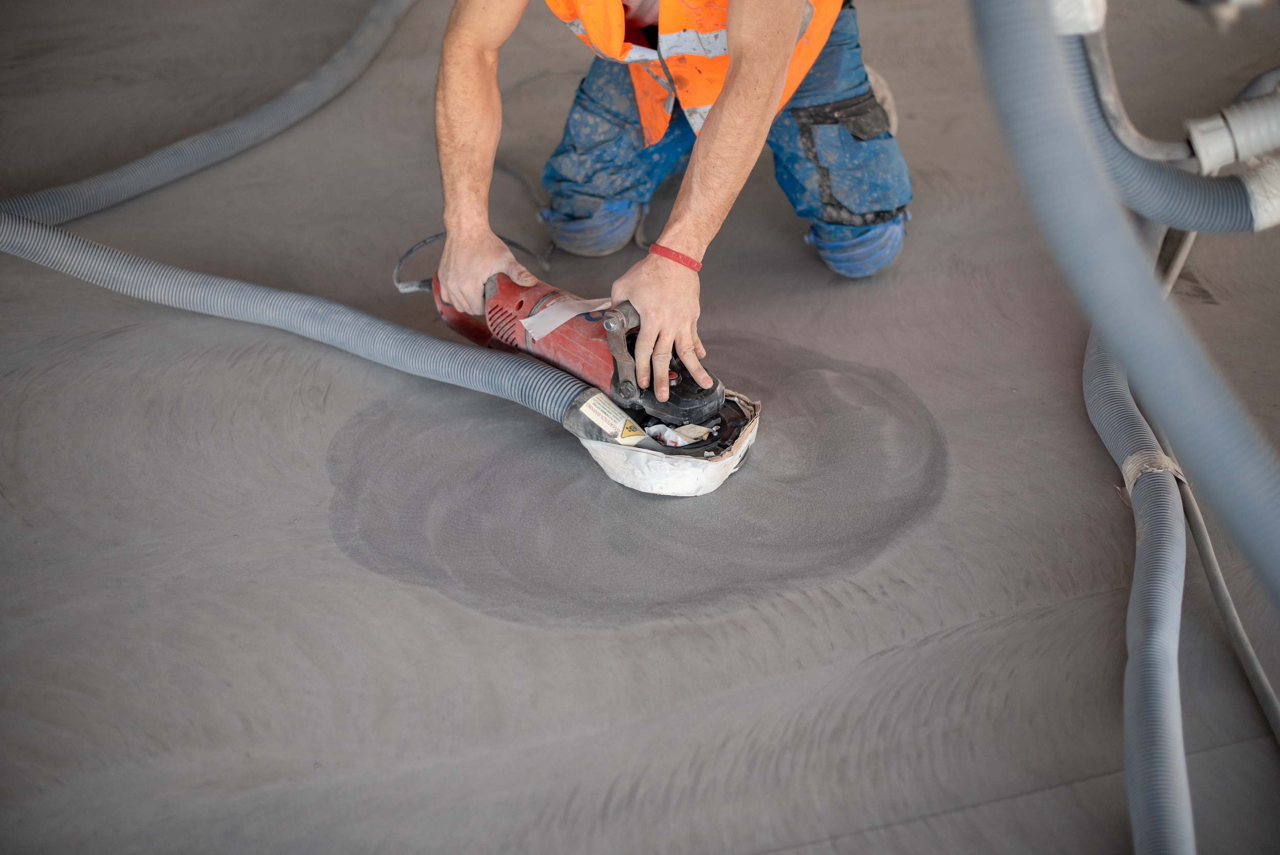 Concrete preparation by grinding surface